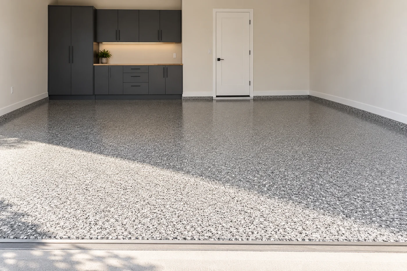 Concept garage with a gray decorative flake floor and soft sunlight